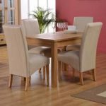 Corrick Dining Table And 4 Ivory Faux Leather Dining Chairs
